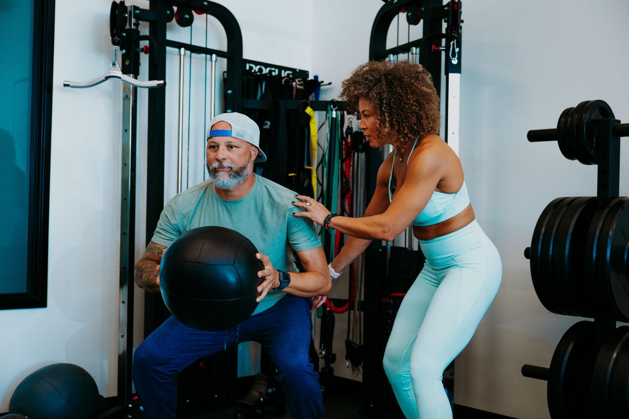 Andrea and Jason reviewing a workout together